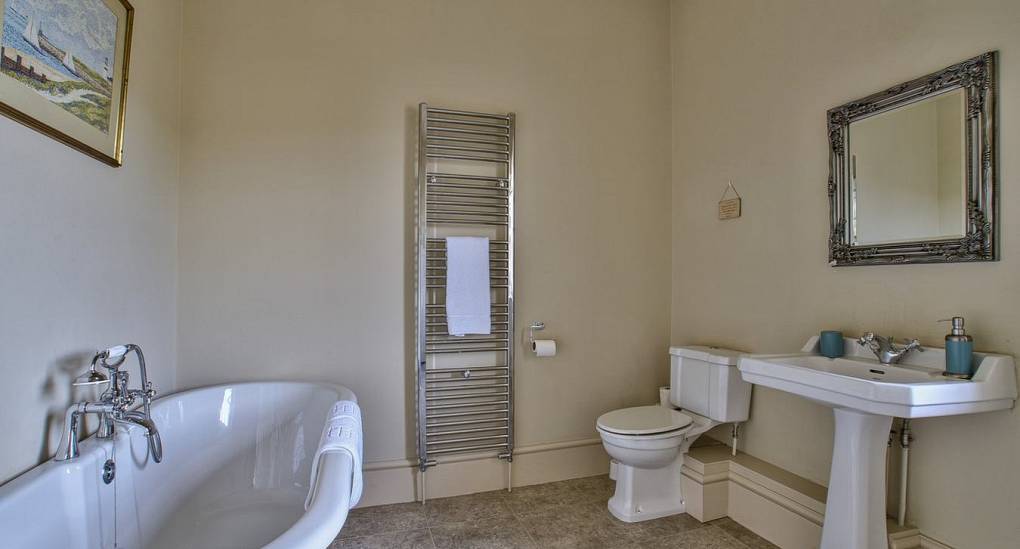 Family bathroom with full size bath