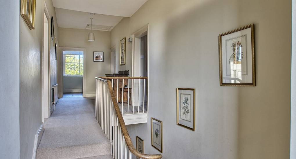 Hallway upstairs leading to the bedrooms
