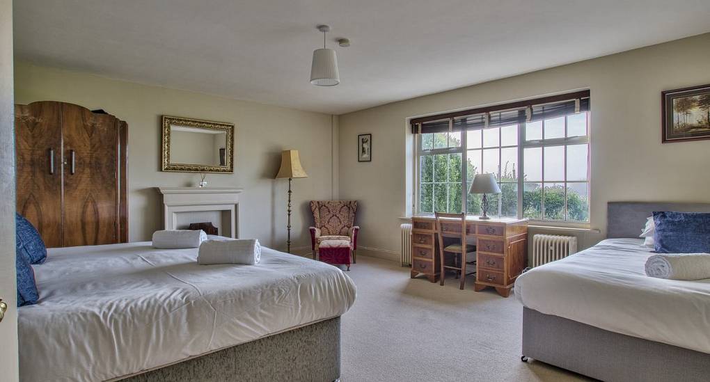 Big bedroom with two double beds
