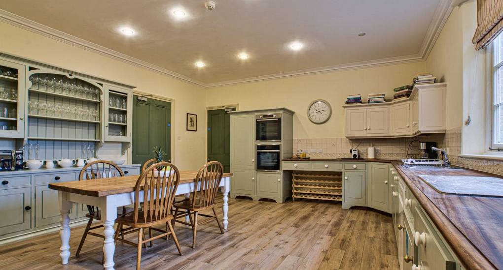 Wooden floor in kitchen with spot lights