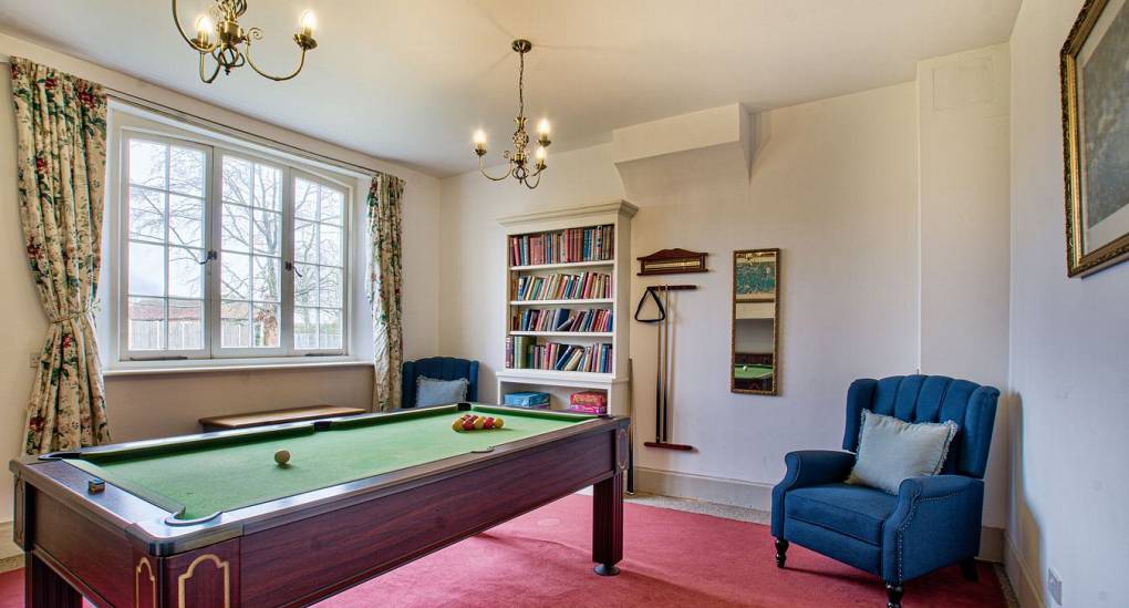 Games room in house with pool table