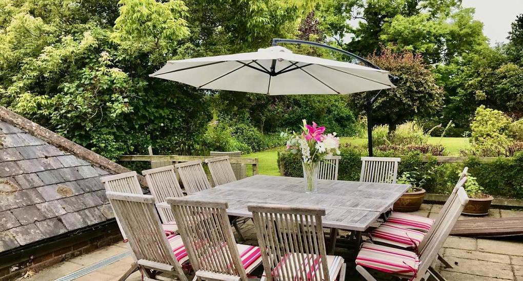 Garden chairs and table with umbrella 