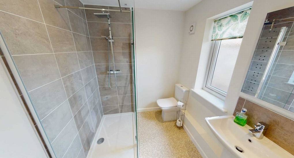 Shower room with sink and toilet 