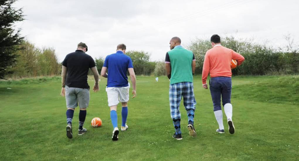 Footgolf players approaching the tee