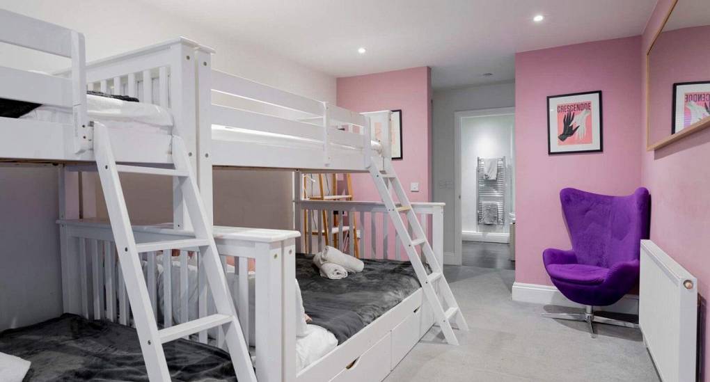 Large bedroom with double bunk beds