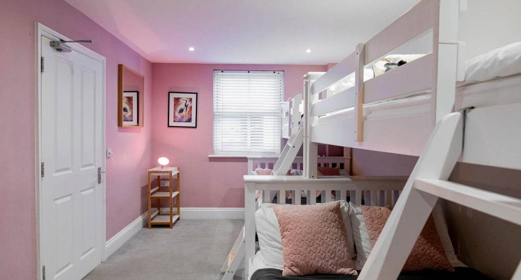 Long view of the pink bedroom