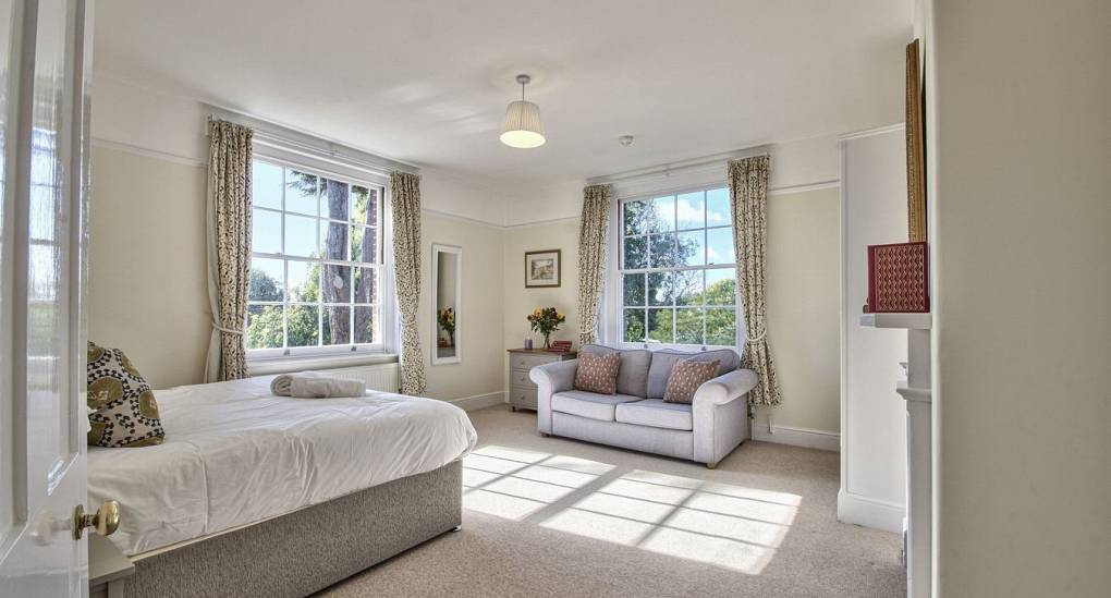 Natural light in bedroom with double bed