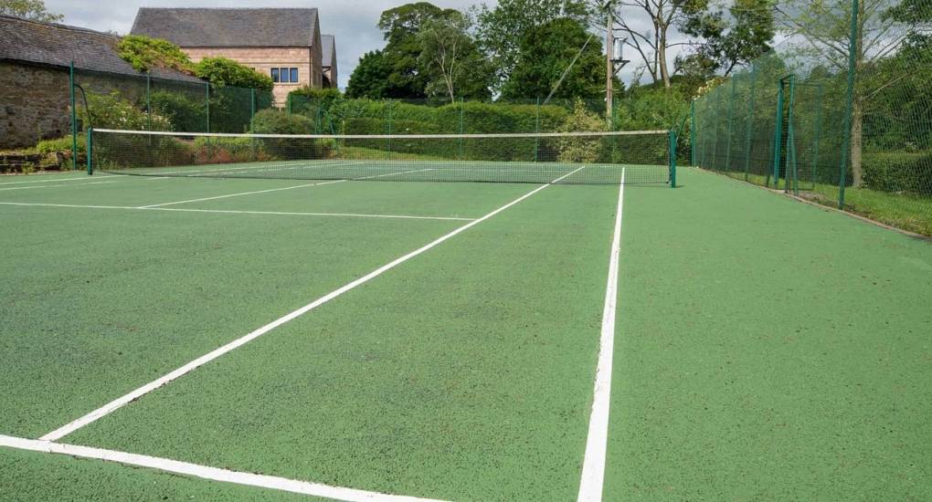 Private tennis courts at Lathkill Escape for active hen party groups staying in the Peak District.