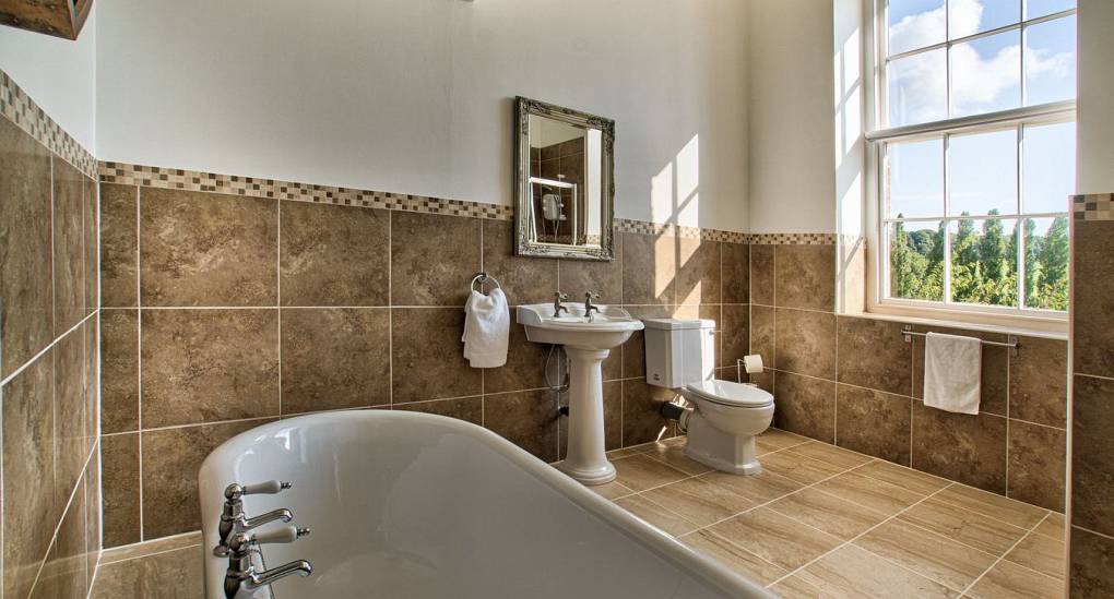 Large bath tub in bathroom