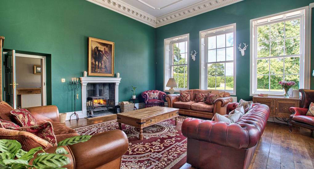Lit fireplace in Lounge 