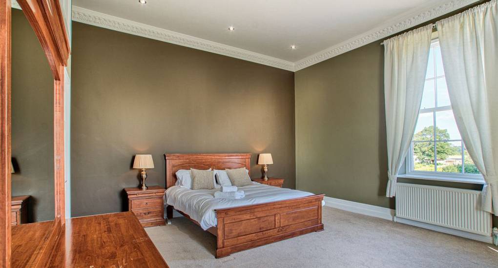 Large double bedroom with spot lights