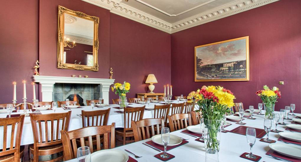 Dining room tables set up for dinner