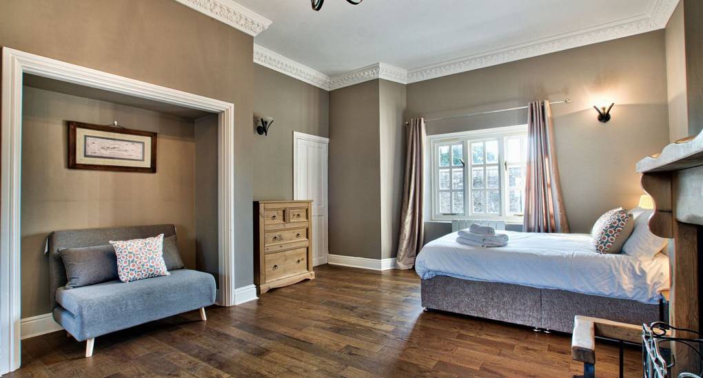 Wooden floor in double bedroom