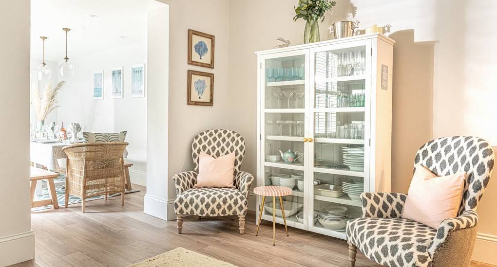 Open-plan lounge and dining area at The Drift: A luxury Bournemouth hen party house with social flow and group seating for 14.