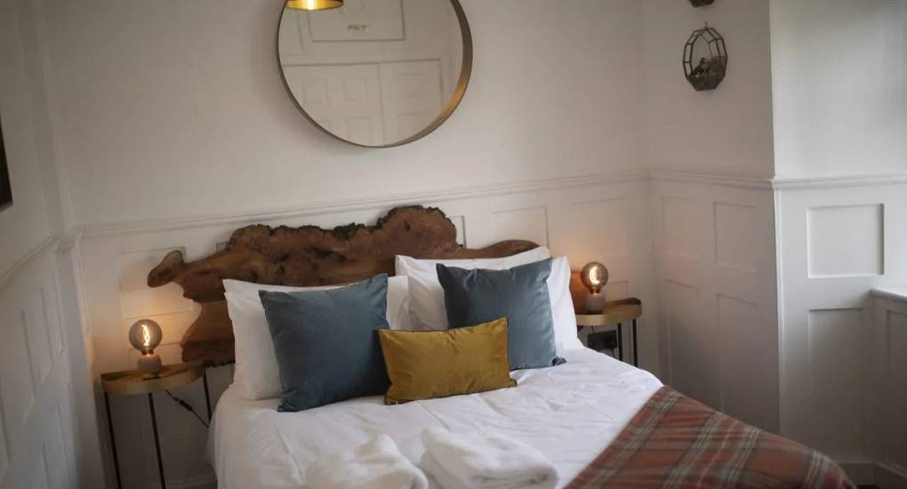 Large bedroom with contemporary decor at Lux Life, providing a stylish base for Edinburgh city centre stag weekends and group celebrations.