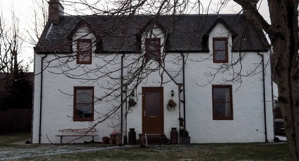 Luxury vaulted kitchen and social dining area at Lux Lodge, seating 10 guests for a Highland hen do.