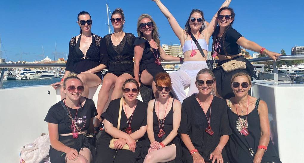 Group of hens enjoy a boat charter in the sun