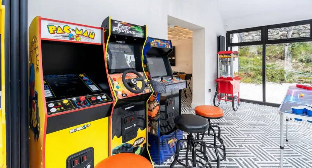 Retro arcade games area inside the Manor on the Mountain games room for hen party entertainment