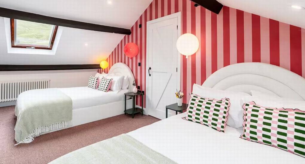 Comfortable twin single beds in one of the luxury bedrooms at the Manor on the Mountain