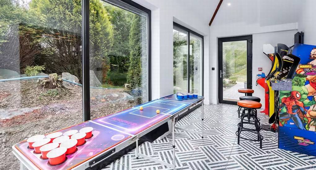 Beer pong table set up for games inside the Manor on the Mountain hen party games room