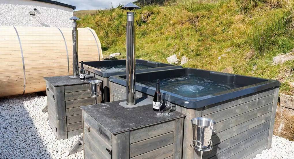 Close-up of the two traditionally heated outdoor hot tubs at the Manor on the Mountain luxury hen accommodation