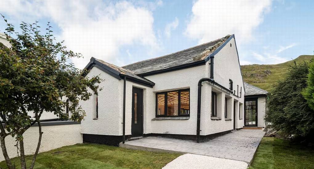 Full outside elevation view of the Manor on the Mountain luxury Lake District hen accommodation