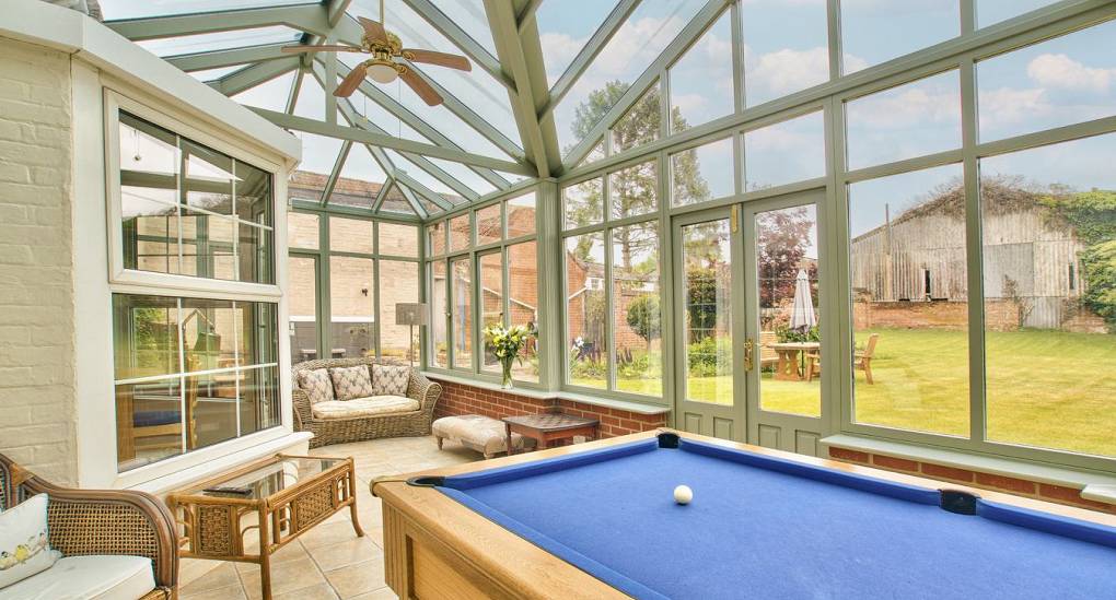 Pool table in the conservatory at Meadowbrook Farm Hen House