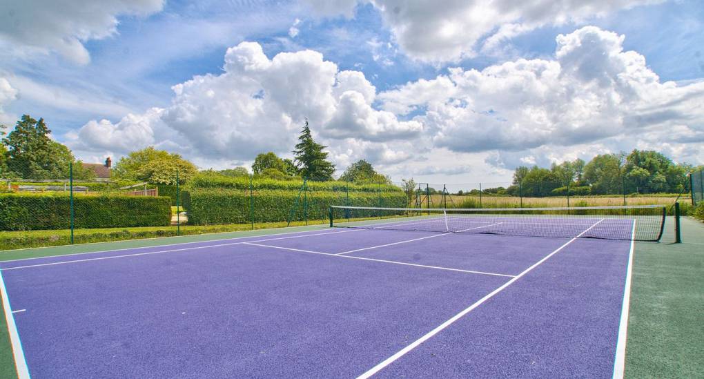 Private tennis court included at Meadowbrook Farm Hen House