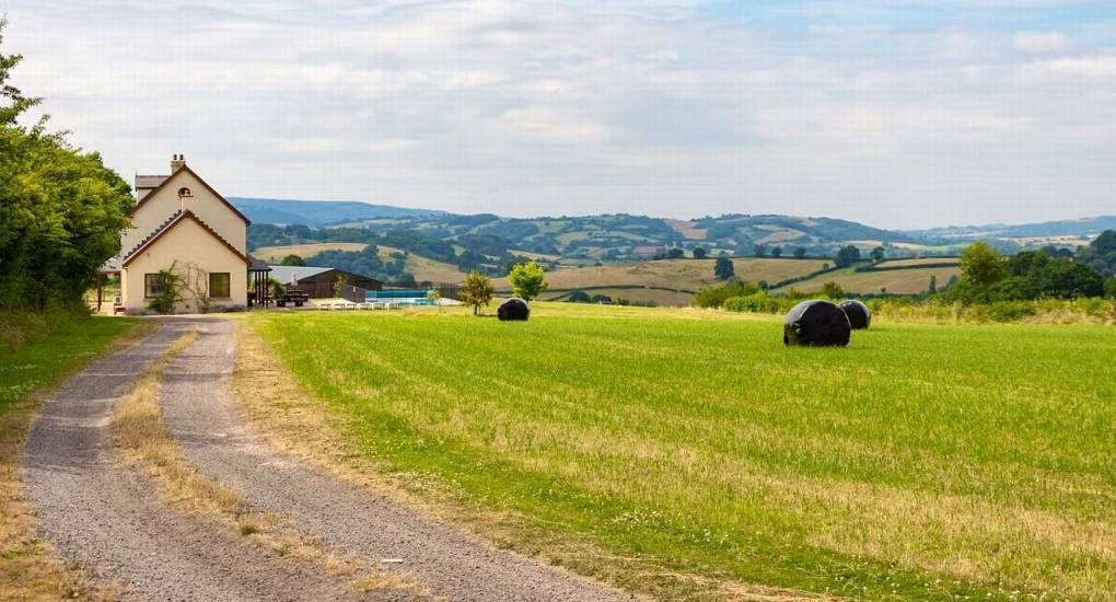 Countryside holiday house with swimming pool set in rolling Welsh hills, scenic venue for a Monmouthshire hen do.