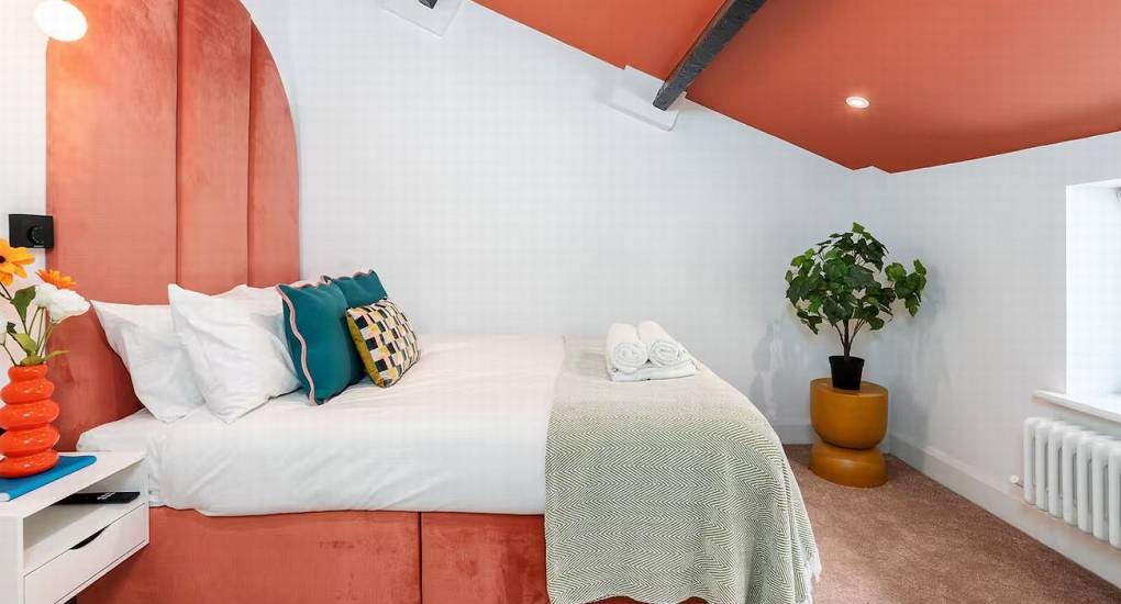 Double bedroom 5 with unique decor and storage for a Mountaintop Marvel hen weekend