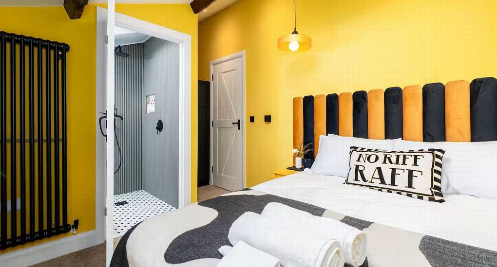 View into the en-suite bathroom from double bedroom 4 at the Lake District luxury house