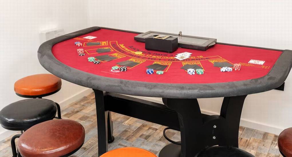 Blackjack or poker table inside the exclusive Mountaintop Marvel casino room for hen parties