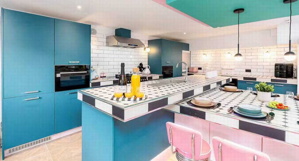 View of the spacious kitchen area from the retro dining booth, perfect for a Lake District hen party
