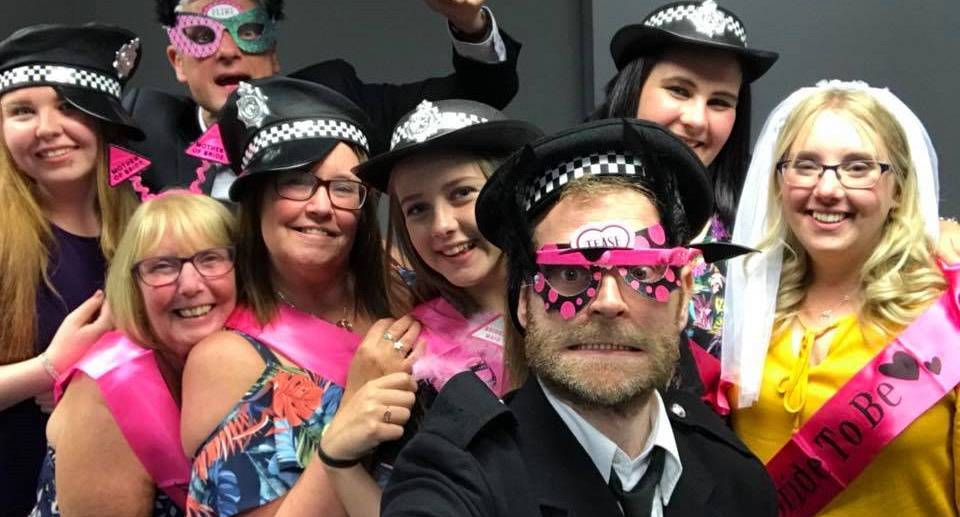 Murder Mystery actors pose with a hen do