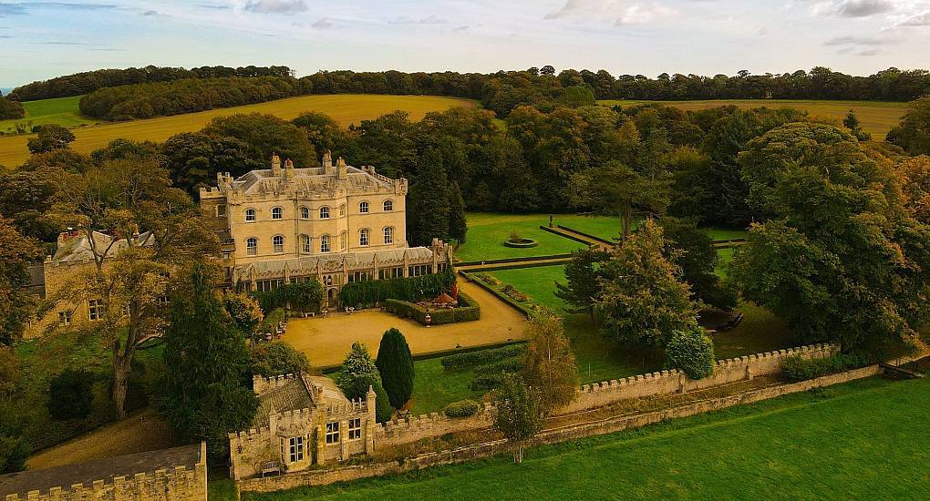 The stunning exterior and grounds of Country Fortress, a premier Newcastle hen party house with a private hot tub.