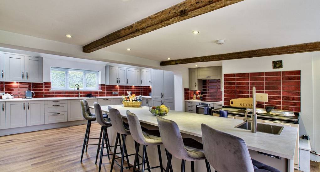 Future looking kitchen with breakfast table and chairs