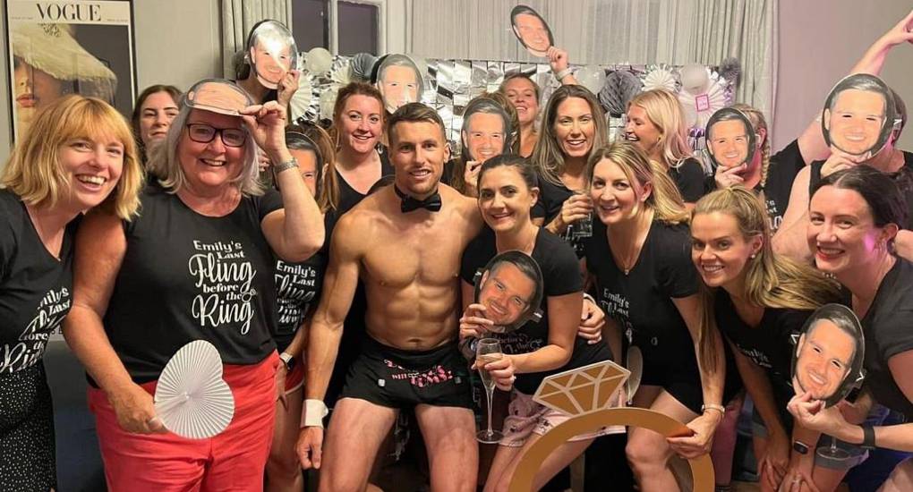 Cheeky butler poses with hen do