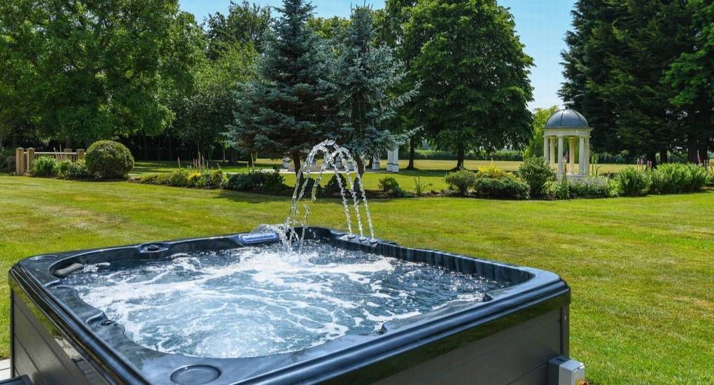 High-end hot tub and countryside views at The Parsonage, a premier Nottinghamshire hen party manor house.