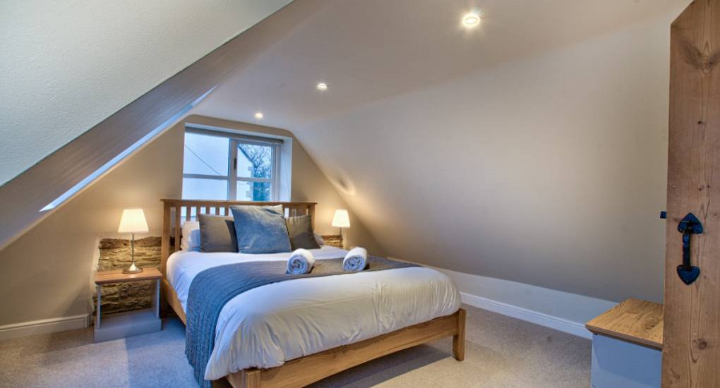 Double bedroom with sloped ceiling