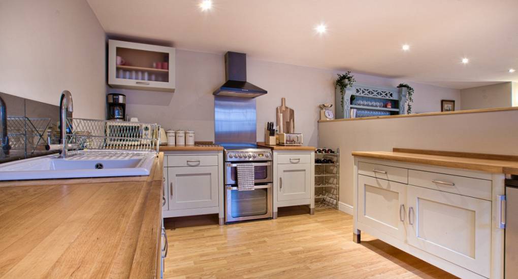 Fully fitted kitchen with spot lights