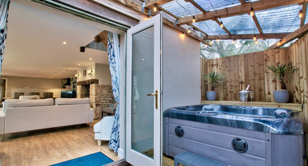 Open patio doors to the hot tub