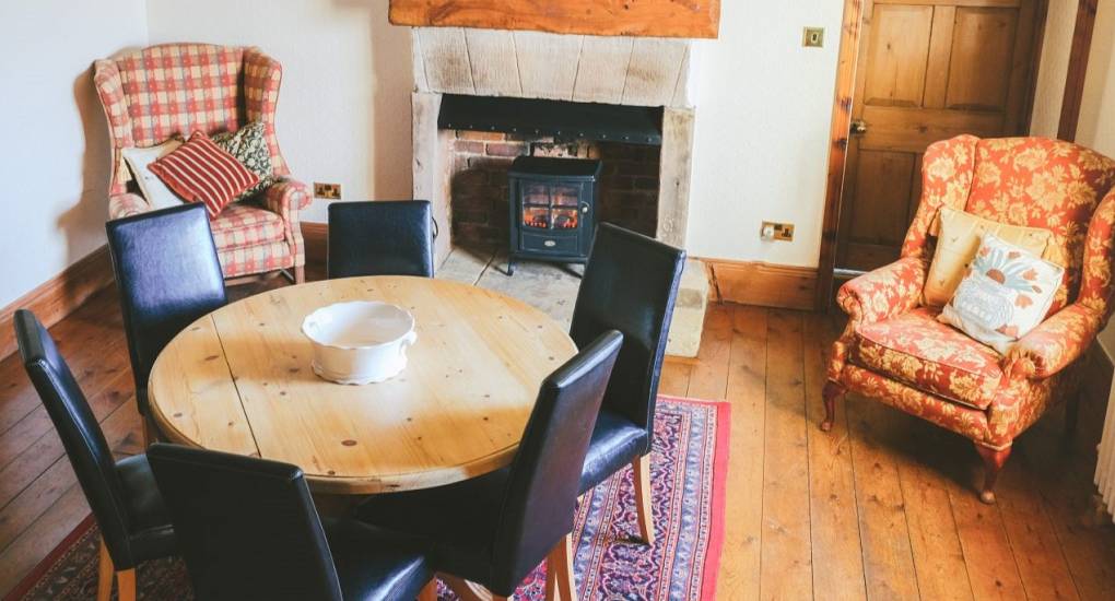 Part of the lounge area with coffee table and a couple of chairs