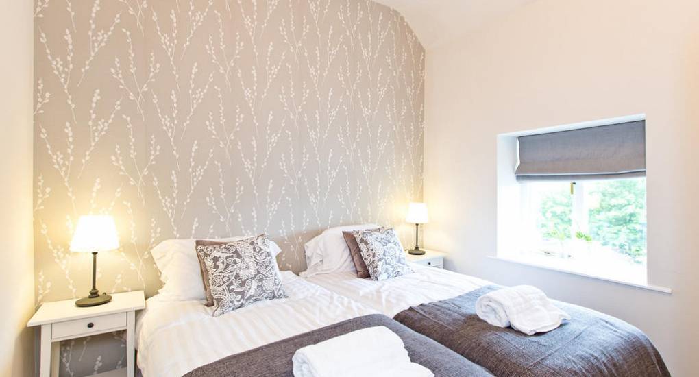 Bedroom four at Peak Star: A spacious double bedroom with traditional country charm for a Peak District hen do.