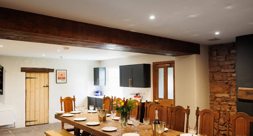 The large dining table at the Regal Manor two luxury party house