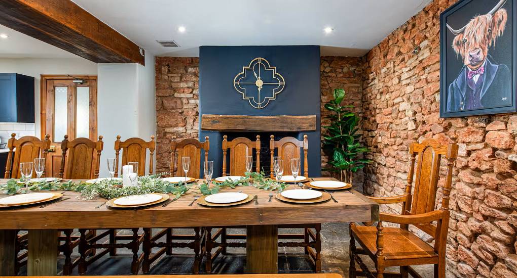 End of the dining table at the Regal Manor two luxury party house