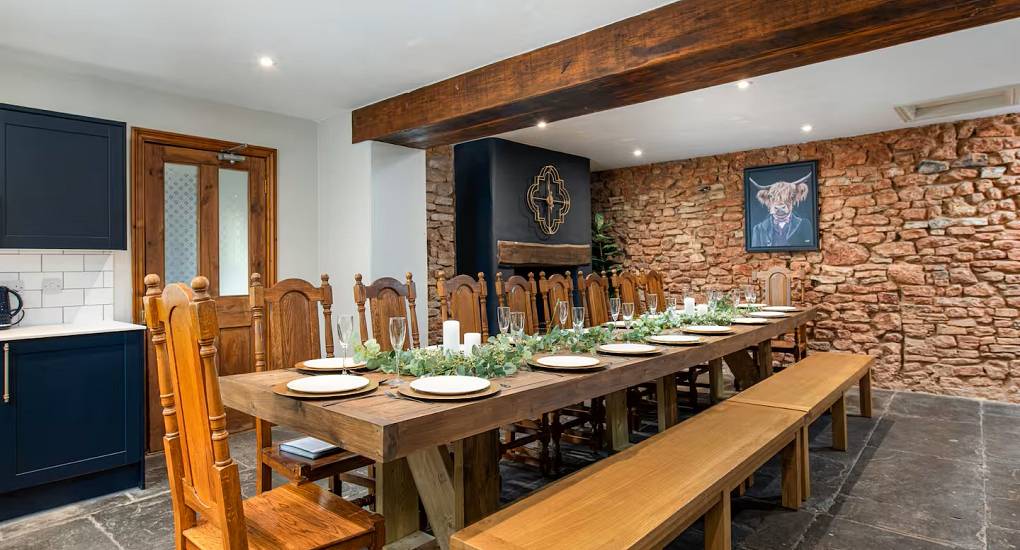 Full view of the dining table at the Regal Manor two luxury party house