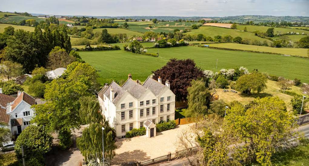 Drone view of the overall house at the Regal Manor two luxury party house