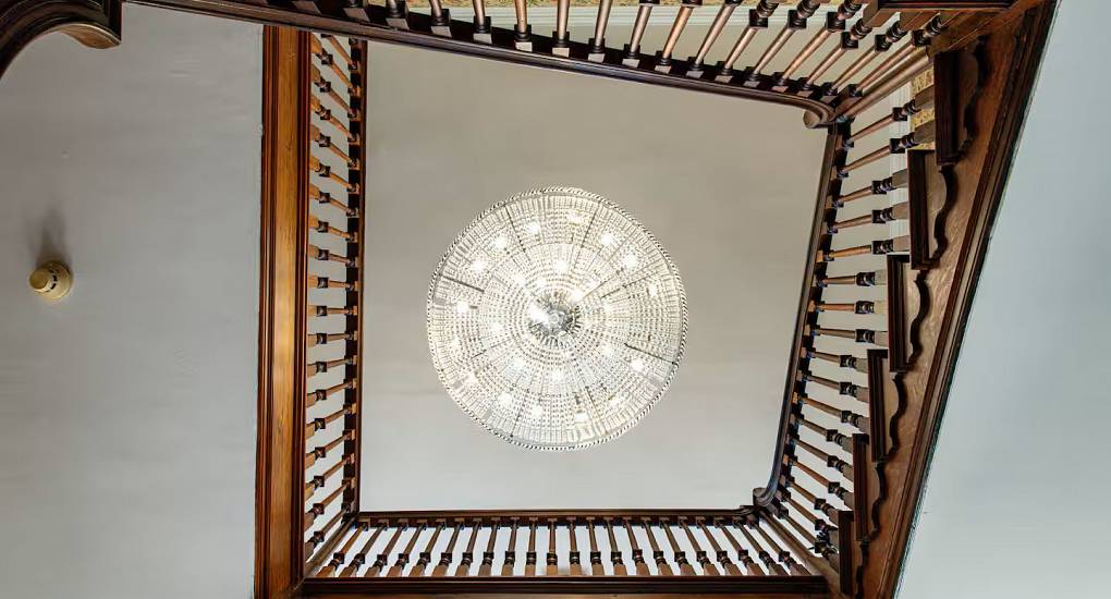 Spiral staircase at the Regal Manor two luxury party house