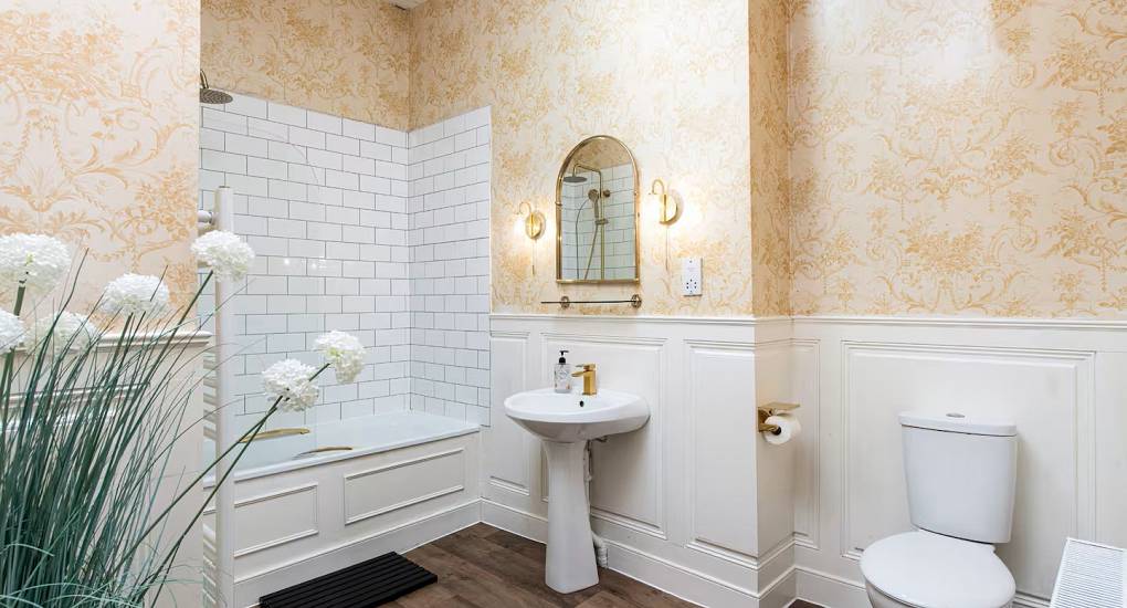 Light and airy Bathroom at the Regal Manor two luxury party house