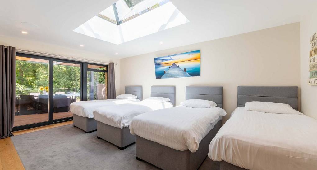 This bedroom at Retreat 12 sleep 4 people with a skylight